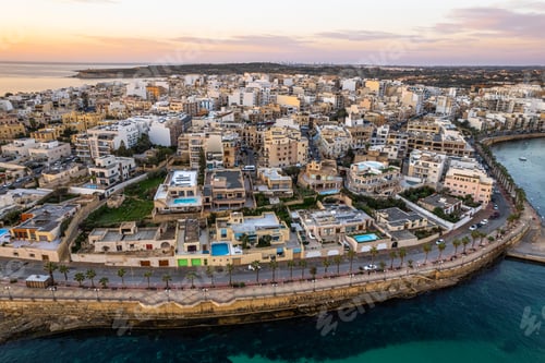 Preview: Marsaskala townscape at sunrise, Malta. Aerial drone view