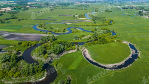 Preview: Curvy Nida river bends in Swietokrzyskie,Ponidzie region in Poland. Aerial Drone View