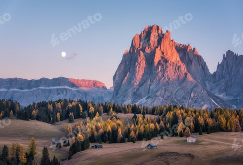 Preview: Beautiful mountains with lighted peaks at sunset in autumn
