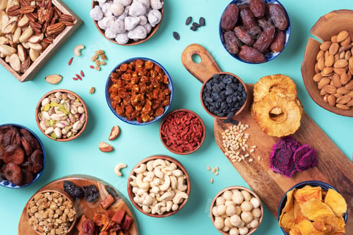 Preview: Assortment of nuts and dried fruits - brazil nuts, cashew, pecan, almonds, macadamia, pine nuts