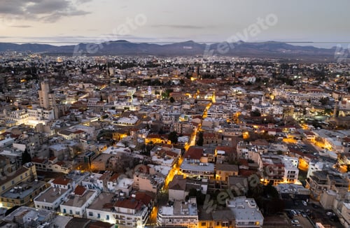 Preview: Aerial drone photograph of cityscape of Nicosia town in Cyprus at sunset