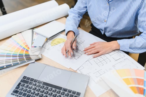 Preview: Architect making blueprint drawing for interior design project