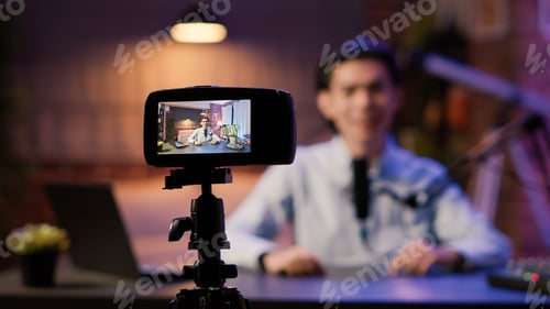 Preview: Camera on tripod recording influencer talking to audience