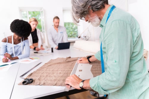 Preview: Team of fashion designers at work