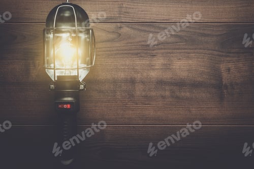 Preview: hand lamp on wooden background