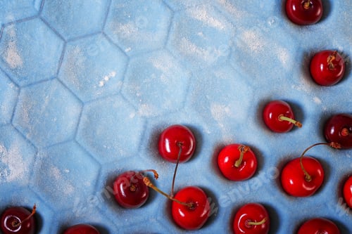 Preview: Blue Dough And Cherries On A Bright Background