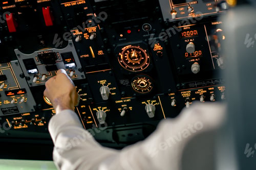 Preview: Airplane cabin The pilot checks the electronics by pressing the buttons Preparing passenger liner