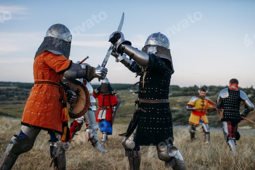 Preview: Knights in armour and helmets fight with swords