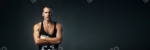 Preview: Serious Man with Arms Crossed Wide Banner