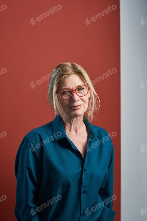Preview: Senior elegant businesswoman in blouse