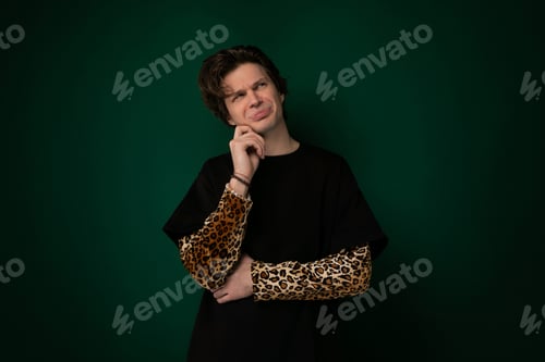 Preview: Woman Posing in Front of Green Background