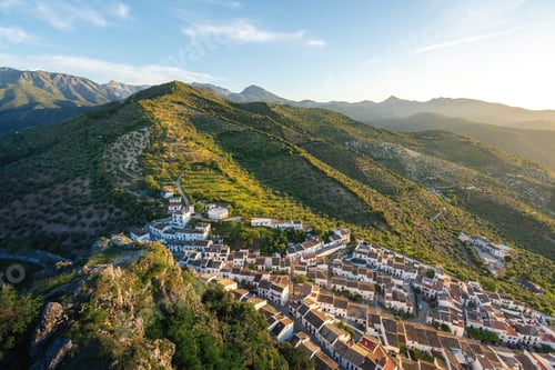 Preview: Aerial view of Zahara de la Sierra white houses and hills - Zahara de la Sierra, Andalusia, Spain