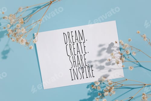 Preview: Dream, create, share, inspire words written on card.