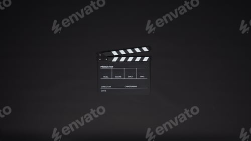 Preview: Clapper board on black background.