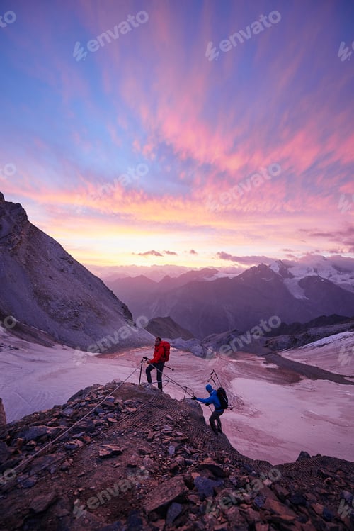 Preview: Hikers climbing rock at sunset, Mont Cervin, Matterhorn, Valais, Switzerland