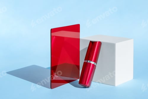 Preview: Red lipstick with geometric shapes on light blue background