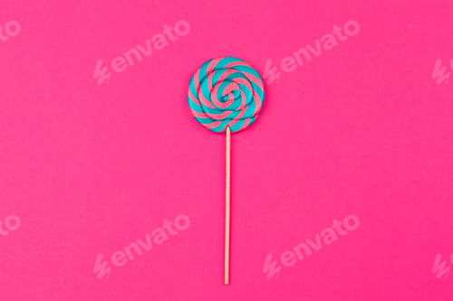 Preview: Colorful lollipop. Flat lay. Minimal concept