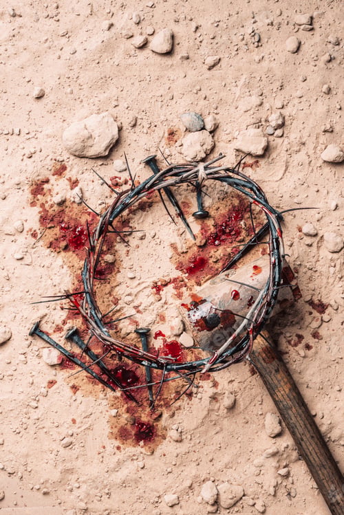 Preview: Crown of thorns, bloody nails on sand background. Good Friday, Passion of Jesus Christ. Christian