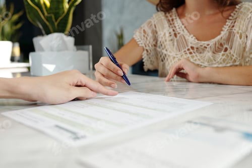 Preview: Signing Document at Travel Agency