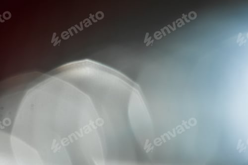 Preview: Soft light creates ethereal shapes and patterns in a dimly lit environment at night