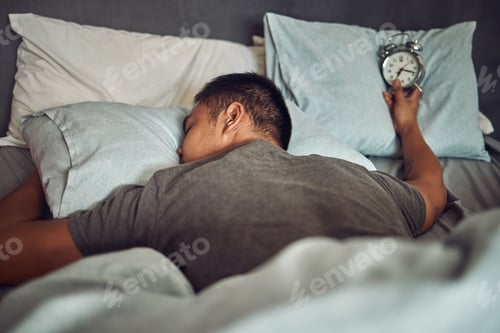 Preview: A good rest resets everything. Shot of a young man sleeping peacefully in bed at home.