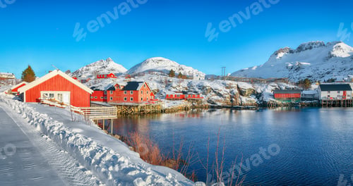 Preview: Captivating morning seascape of Norwegian sea and cityscape of Sorvagen town.