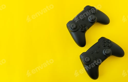 Preview: Isolated game joysticks on a yellow background. Gamer playing at home, relaxing with friends