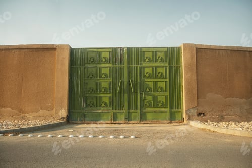 Preview: Old green metal gate doors