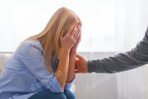 Preview: Millennial woman crying, therapist supporting her at personal meeting