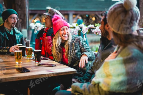 Preview: Young friends having fun together drinking craft beers at pub restaurant