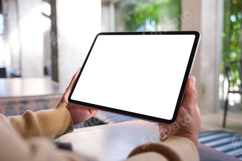 Preview: Mockup image of a woman holding digital tablet with blank desktop screen in cafe