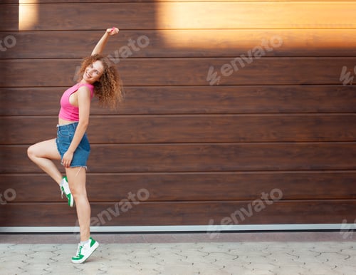 Preview: beautiful curly woman in city