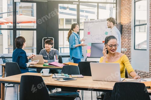 Preview: Portrait of Businesswoman working with computer over the photo blurred