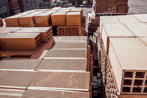 Preview: Pile of new bricks stacked to build a wall in a building supplies store.