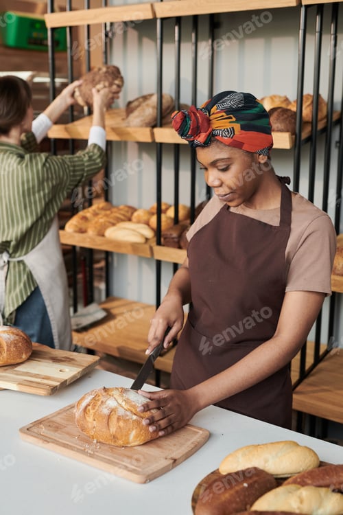 Preview: Owner working in bakery shop
