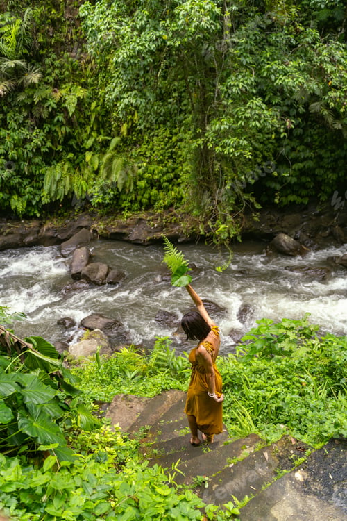 Preview: Active young female going downstairs to river