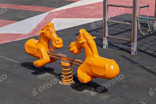 Preview: Empty children's swing in playground closed during Coronavirus Covid-19 quarantine