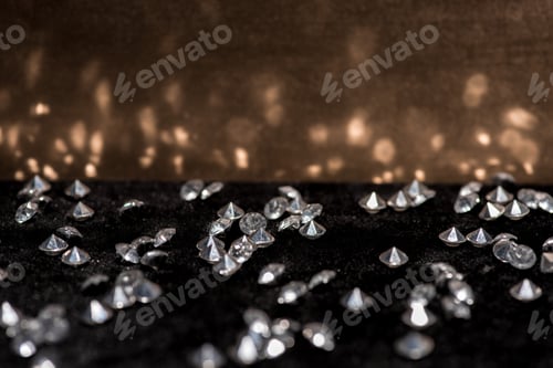 Preview: Selective focus of gemstones on velvet surface with reflection