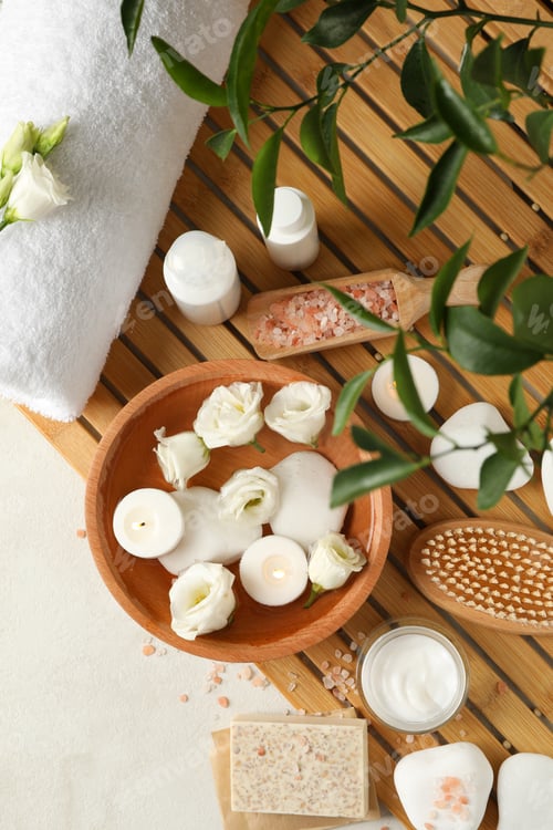 Preview: Spa accessories on white textured background, top view