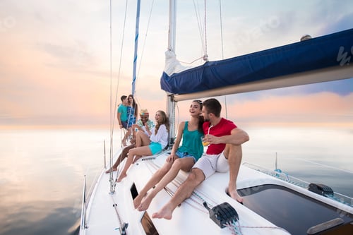 Preview: Young people sitting on yacht