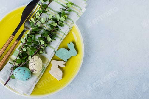 Preview: Easter holiday Card Table Setting. Wooden Easter eggs and little rabbit on blue background.
