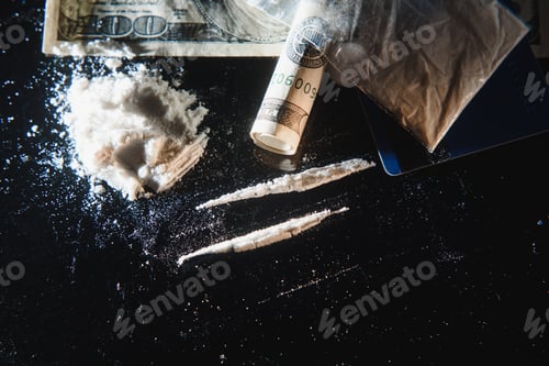 Preview: Hard drugs on dark table.