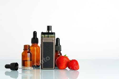 Preview: Electronic cigarette liquid with strawberry flavor on white background