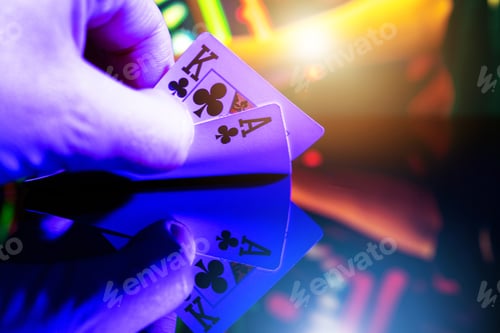 Preview: Poker Player with Two Cards in His Hands
