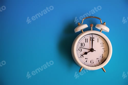 Preview: White alarm clock indicating schedule and deadline on blue background
