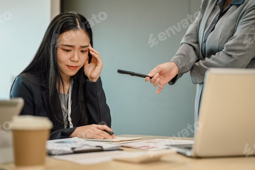 Preview: Upset Businesswoman being scolded by supervisor complaining about work