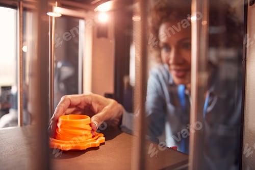 Preview: Mature Female College Student Studying Engineering Using 3D Printing Machine