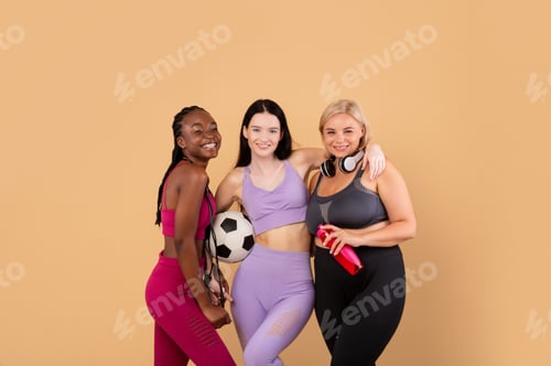 Preview: Sport For Every Body. Cheerful Multi-Ethnic Females In Sportswear Posing Together