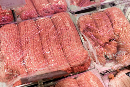 Preview: Various packages of beef or pork minced meat in the supermarket