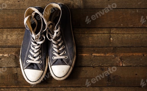 Preview: Gumshoes on wooden background